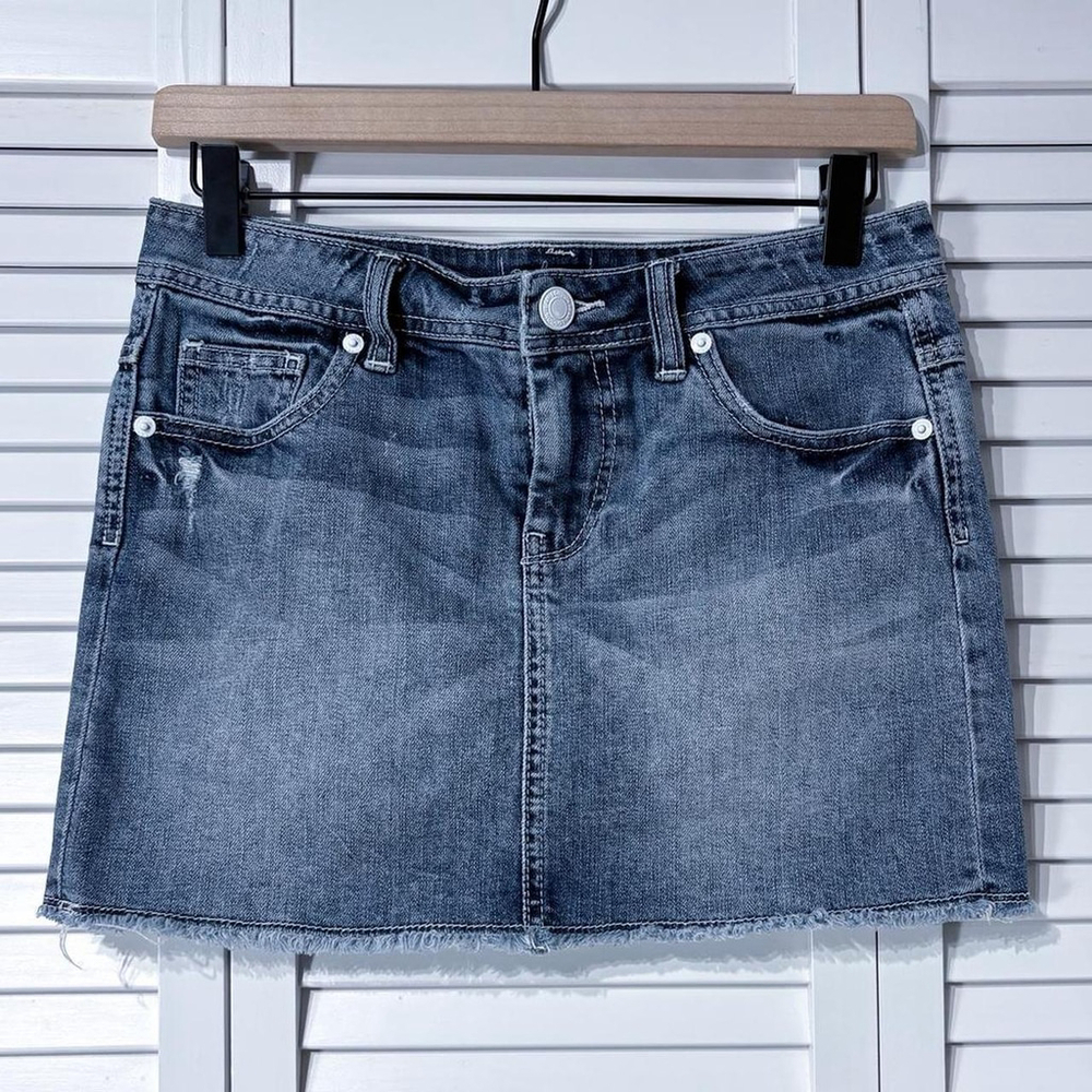 Distressed denim mini skirt
